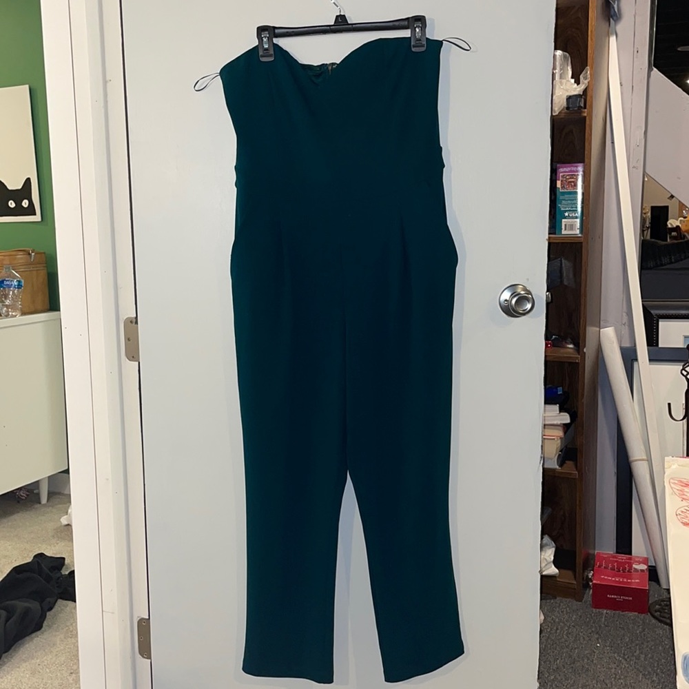 Woman’s forest green strapless jumpsuit